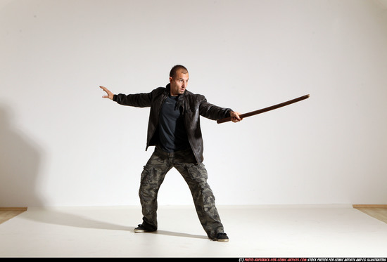 Man Adult Athletic White Fighting with sword Moving poses Casual