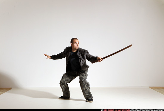 Man Adult Athletic White Fighting with sword Moving poses Casual