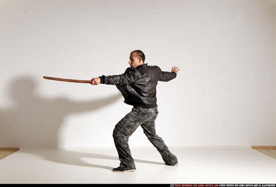 Man Adult Athletic White Fighting with sword Moving poses Casual