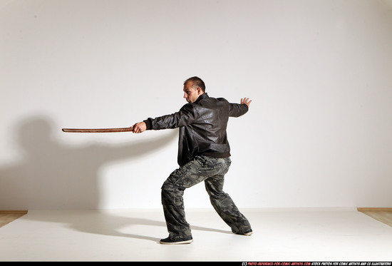 Man Adult Athletic White Fighting with sword Moving poses Casual