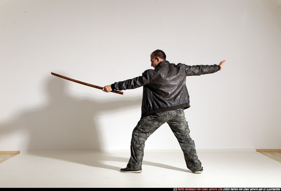 Man Adult Athletic White Fighting with sword Moving poses Casual