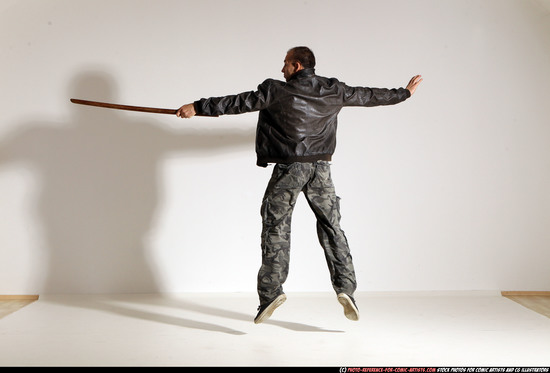 Man Adult Athletic White Fighting with sword Moving poses Casual