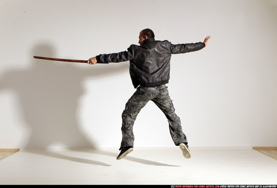 Man Adult Athletic White Fighting with sword Moving poses Casual