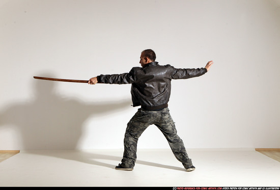 Man Adult Athletic White Fighting with sword Moving poses Casual