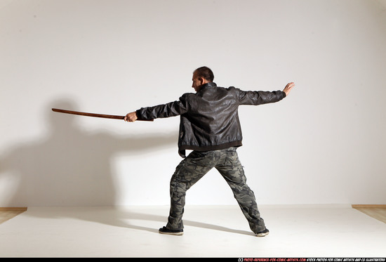 Man Adult Athletic White Fighting with sword Moving poses Casual