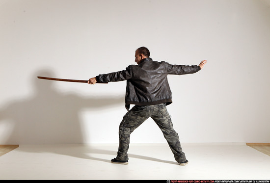 Man Adult Athletic White Fighting with sword Moving poses Casual