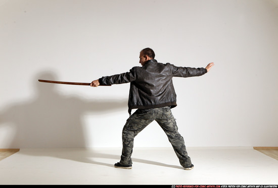 Man Adult Athletic White Fighting with sword Moving poses Casual