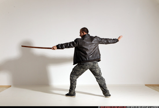 Man Adult Athletic White Fighting with sword Moving poses Casual