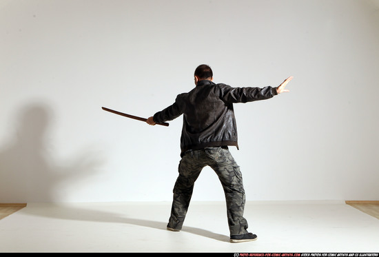 Man Adult Athletic White Fighting with sword Moving poses Casual