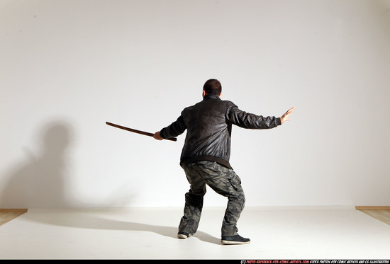 Man Adult Athletic White Fighting with sword Moving poses Casual