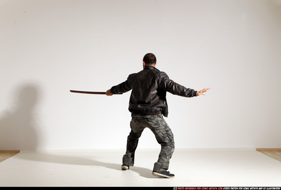 Man Adult Athletic White Fighting with sword Moving poses Casual