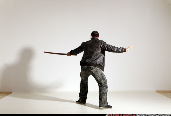 Man Adult Athletic White Fighting with sword Moving poses Casual