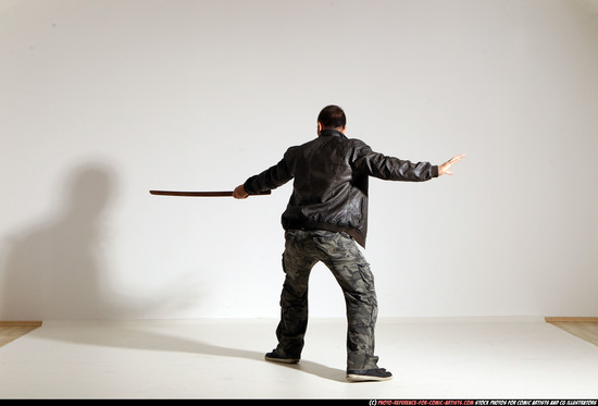 Man Adult Athletic White Fighting with sword Moving poses Casual