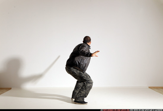 Man Adult Athletic White Fighting with sword Moving poses Casual