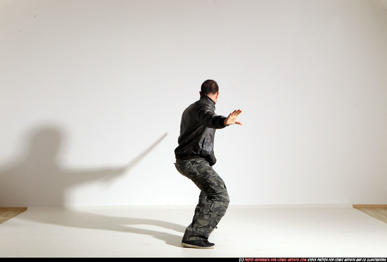 Man Adult Athletic White Fighting with sword Moving poses Casual