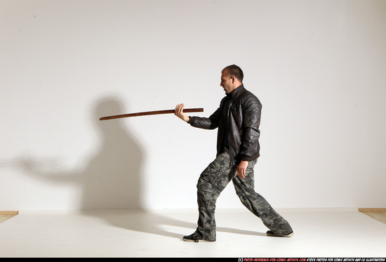 Man Adult Athletic White Fighting with sword Moving poses Casual