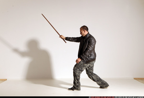 Man Adult Athletic White Fighting with sword Moving poses Casual