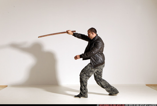 Man Adult Athletic White Fighting with sword Moving poses Casual