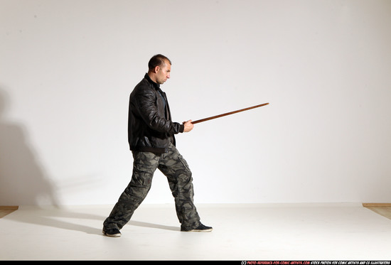 Man Adult Athletic White Fighting with sword Moving poses Casual