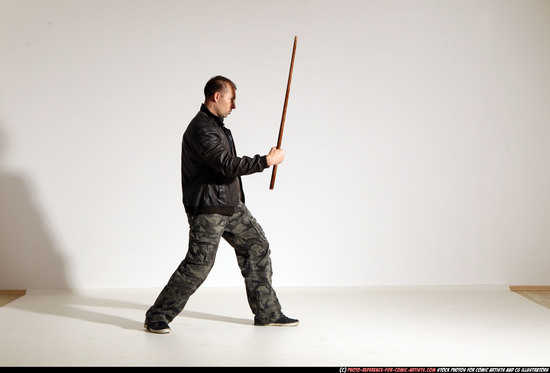 Man Adult Athletic White Fighting with sword Moving poses Casual