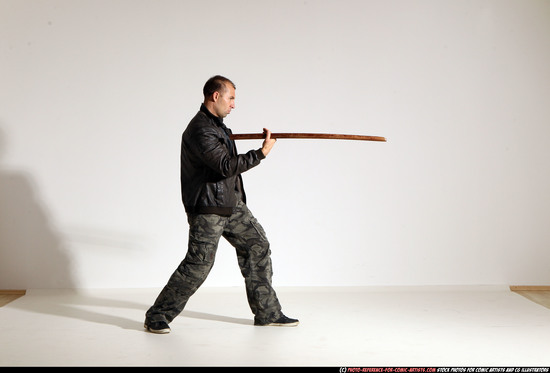 Man Adult Athletic White Fighting with sword Moving poses Casual