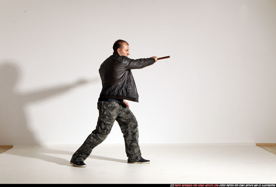 Man Adult Athletic White Fighting with sword Moving poses Casual