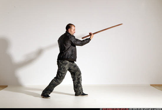 Man Adult Athletic White Fighting with sword Moving poses Casual