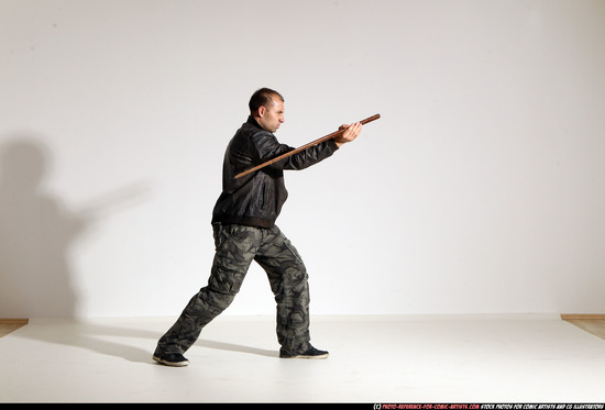 Man Adult Athletic White Fighting with sword Moving poses Casual