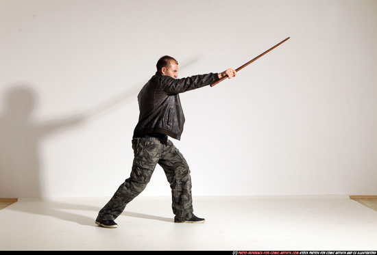 Man Adult Athletic White Fighting with sword Moving poses Casual