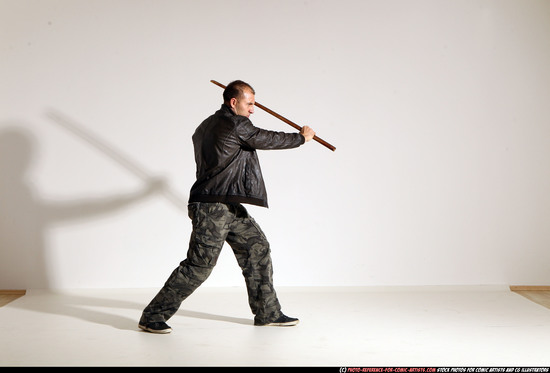 Man Adult Athletic White Fighting with sword Moving poses Casual