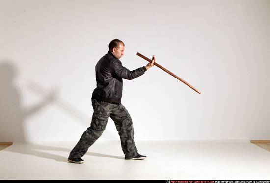 Man Adult Athletic White Fighting with sword Moving poses Casual