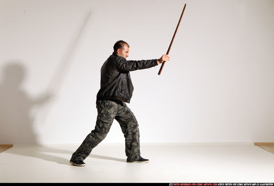 Man Adult Athletic White Fighting with sword Moving poses Casual