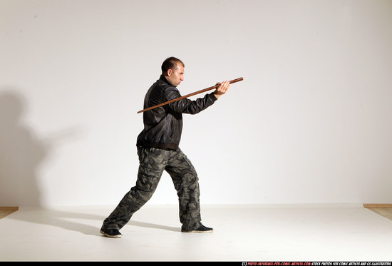 Man Adult Athletic White Fighting with sword Moving poses Casual