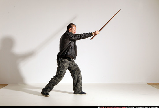 Man Adult Athletic White Fighting with sword Moving poses Casual