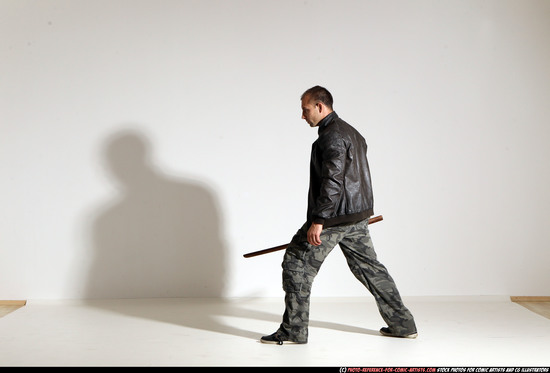 Man Adult Athletic White Fighting with sword Moving poses Casual