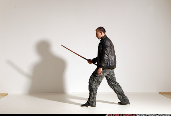 Man Adult Athletic White Fighting with sword Moving poses Casual