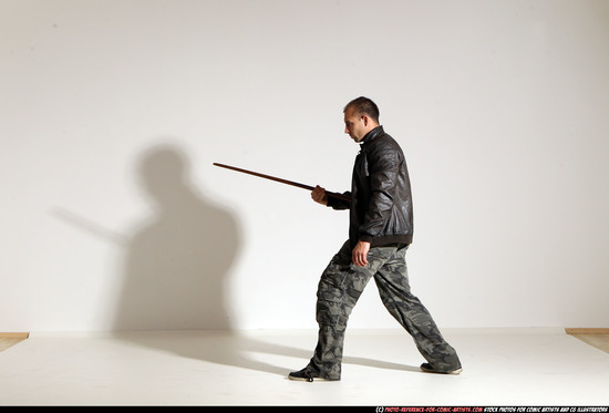 Man Adult Athletic White Fighting with sword Moving poses Casual