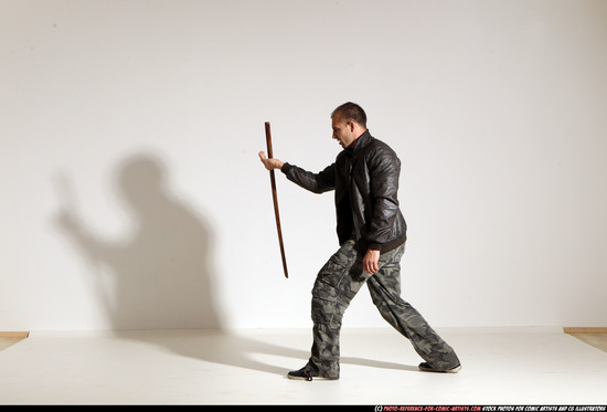 Man Adult Athletic White Fighting with sword Moving poses Casual