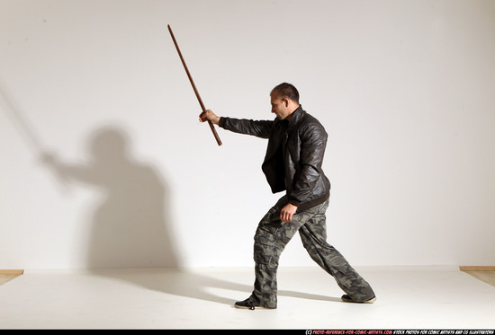 Man Adult Athletic White Fighting with sword Moving poses Casual