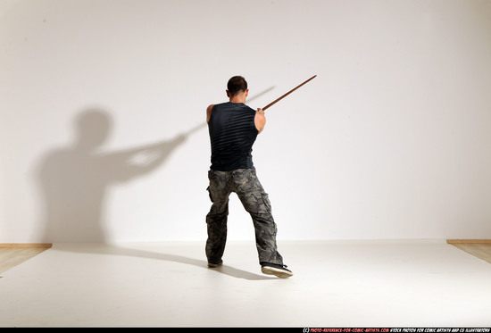 Man Adult Athletic White Fighting with sword Moving poses Casual