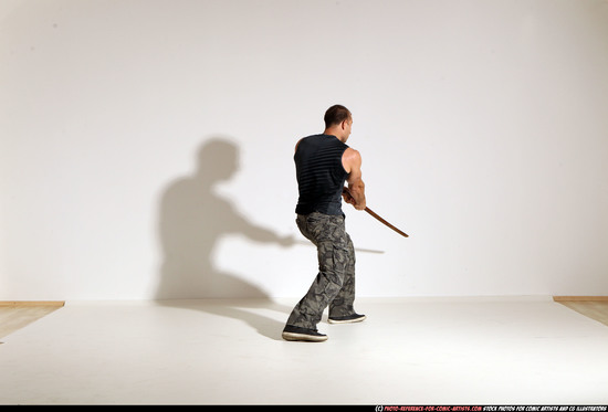 Man Adult Athletic White Fighting with sword Moving poses Casual