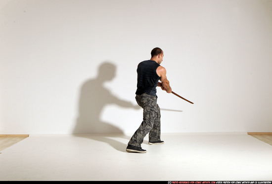 Man Adult Athletic White Fighting with sword Moving poses Casual