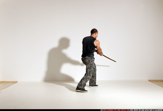 Man Adult Athletic White Fighting with sword Moving poses Casual