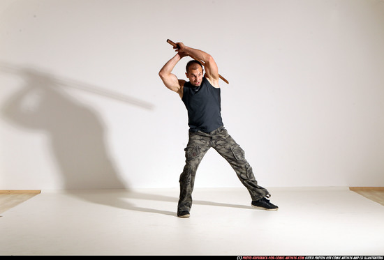 Man Adult Athletic White Fighting with sword Moving poses Casual