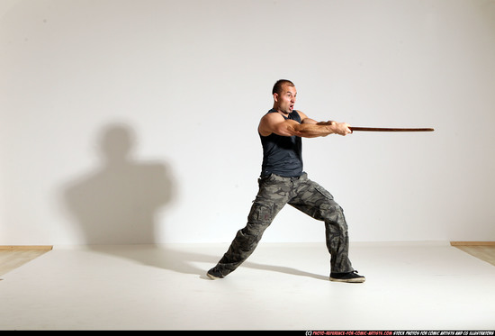 Man Adult Athletic White Fighting with sword Moving poses Casual