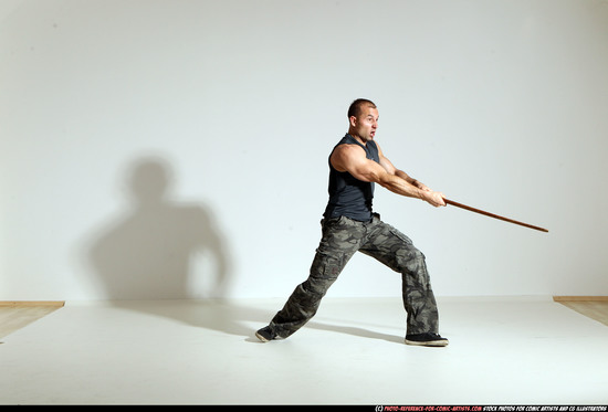 Man Adult Athletic White Fighting with sword Moving poses Casual