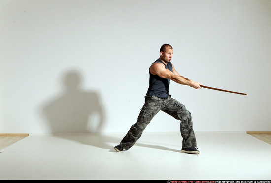 Man Adult Athletic White Fighting with sword Moving poses Casual