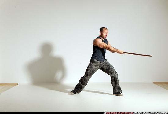 Man Adult Athletic White Fighting with sword Moving poses Casual