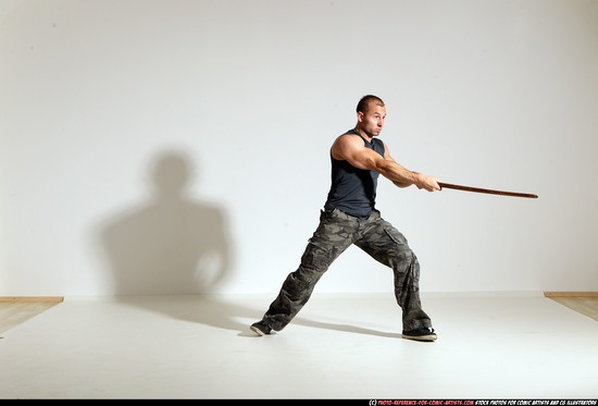 Man Adult Athletic White Fighting with sword Moving poses Casual