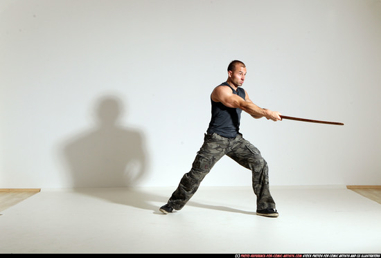 Man Adult Athletic White Fighting with sword Moving poses Casual